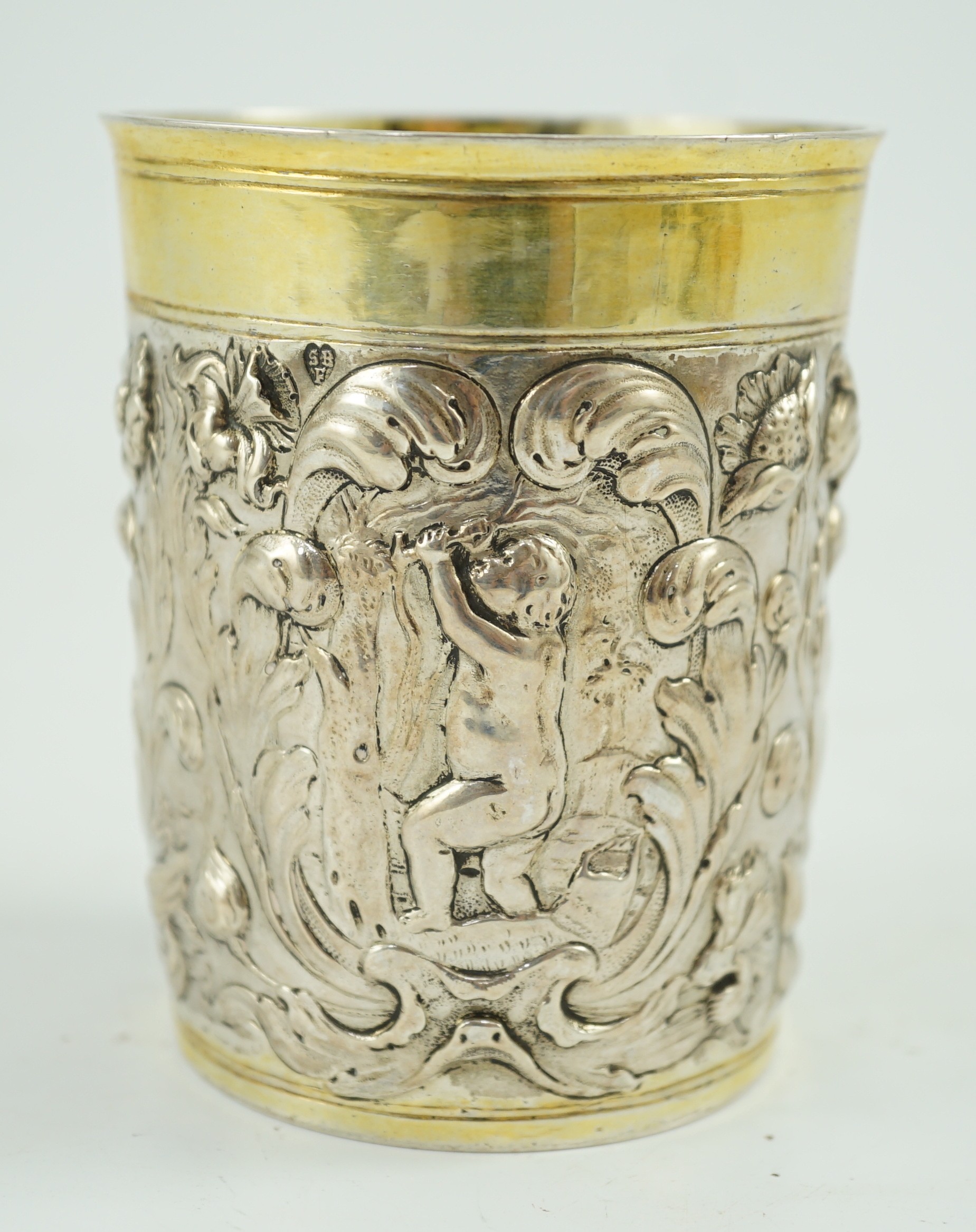 A late 18th century German embossed parcel gilt silver beaker, maker SBF